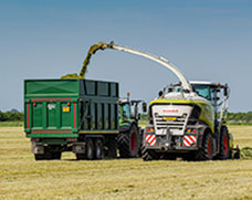 Bailey Silage Trailer being loaded by Claas forager