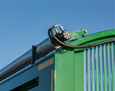 Hydraulic trailer sheeting system