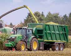 Ejector trailer being loaded with silage