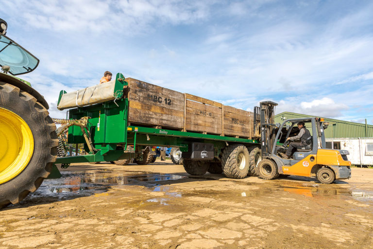 Chris Bailey loading bale trailer