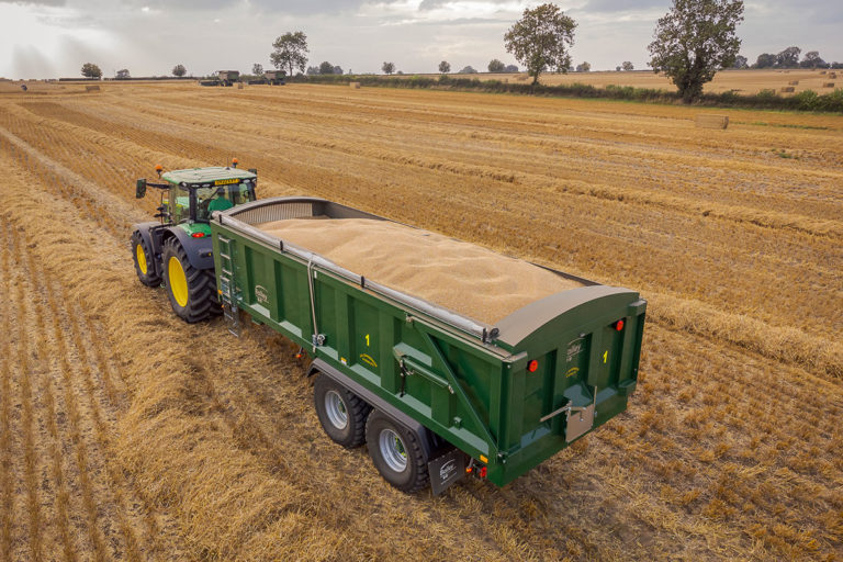 TB loaded with grain in field