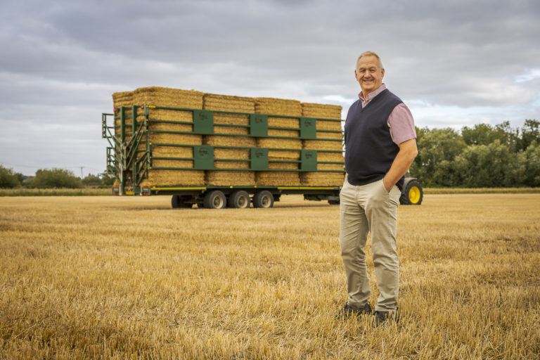 farmer and contractor andrew baxter with his bailey bale trailer